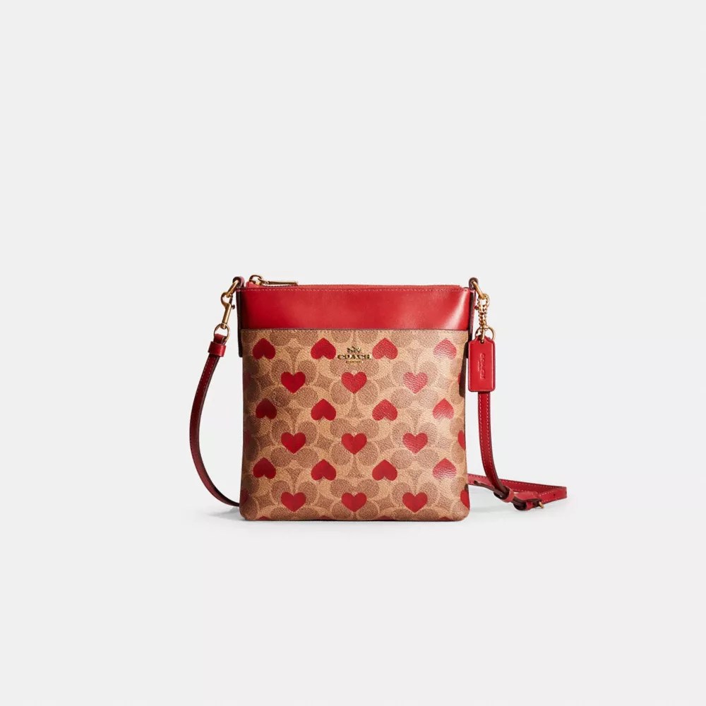 Restored Kitt Messenger Crossbody In Signature Canvas With Heart Print COACH®