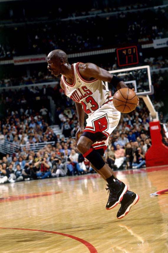Michael Jordan Dribbles in the Jordan XI "Bred" 30 Classic Pictures