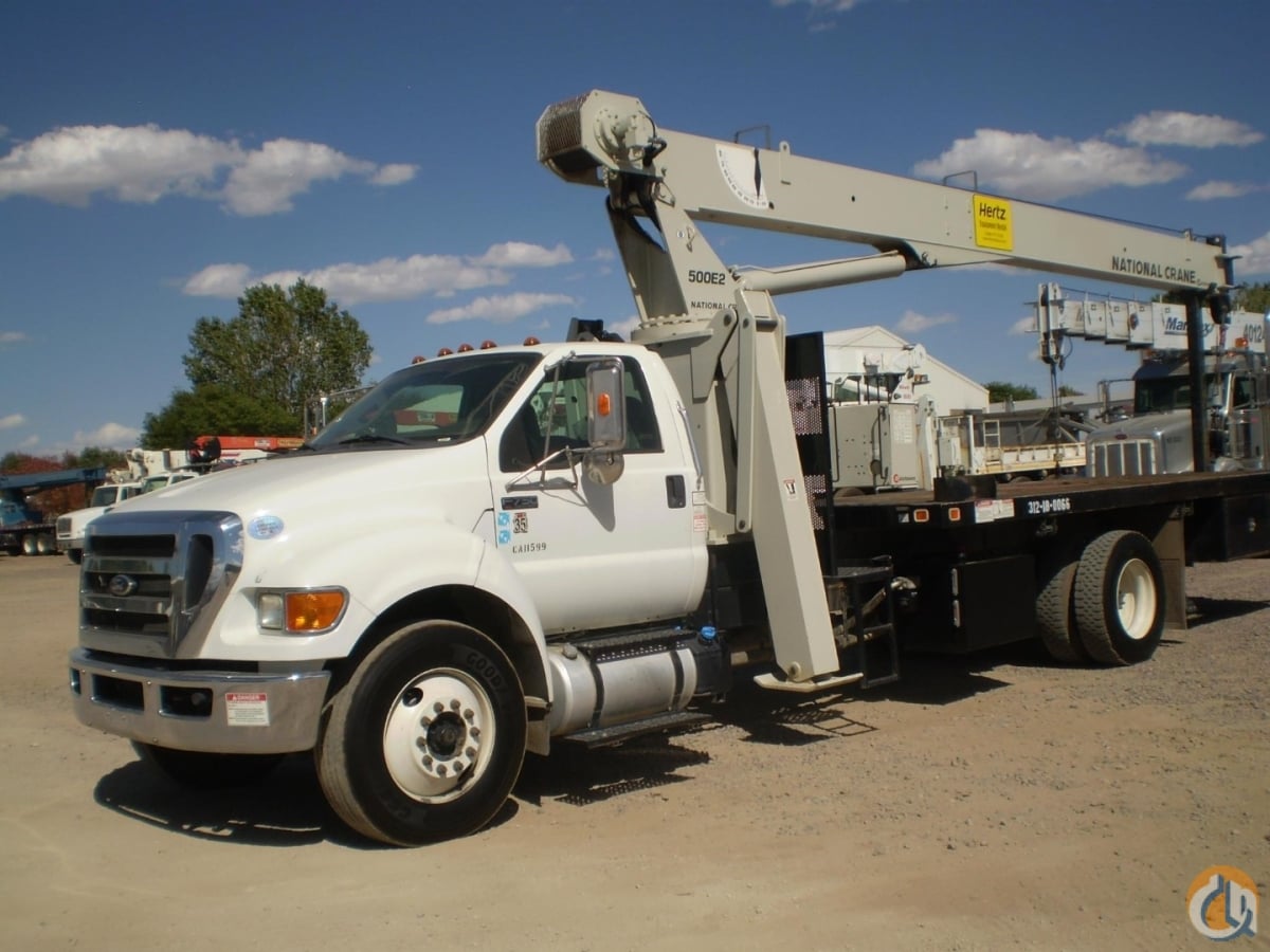 Sold National 571E2 boom truck crane mounted on Ford F750 chassis