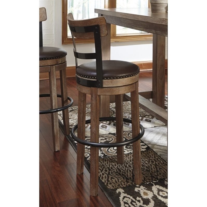 Ashley Furniture Pinnadel 30" Faux Leather Swivel Bar Stool in Brown