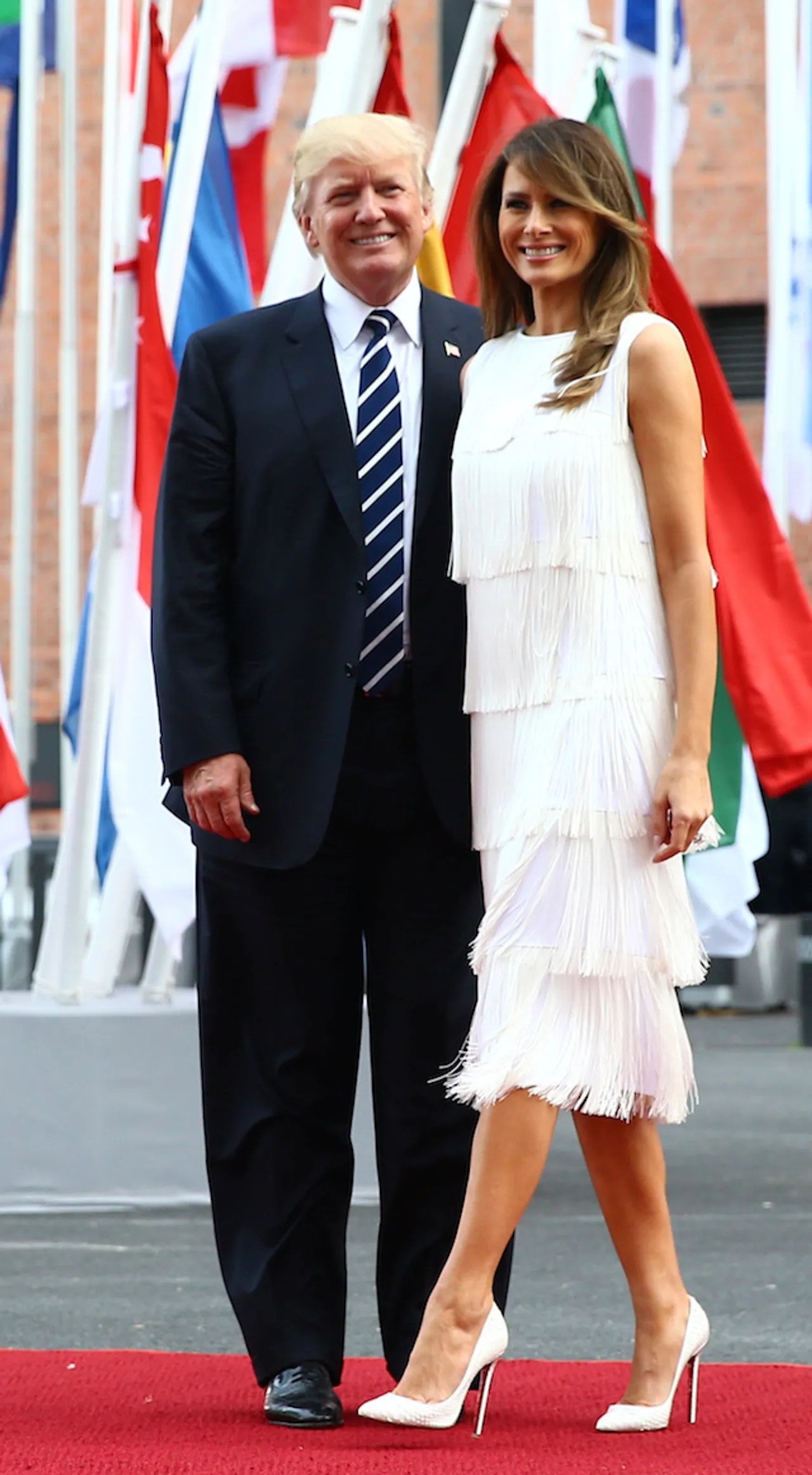 The Dress Melania Trump Greeted Putin In Has Everyone Talking [PHOTOS