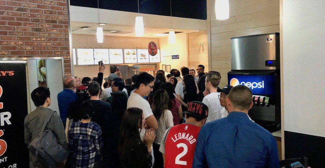 Harvey's has a MASSIVE line in downtown Vancouver for free burgers Dished