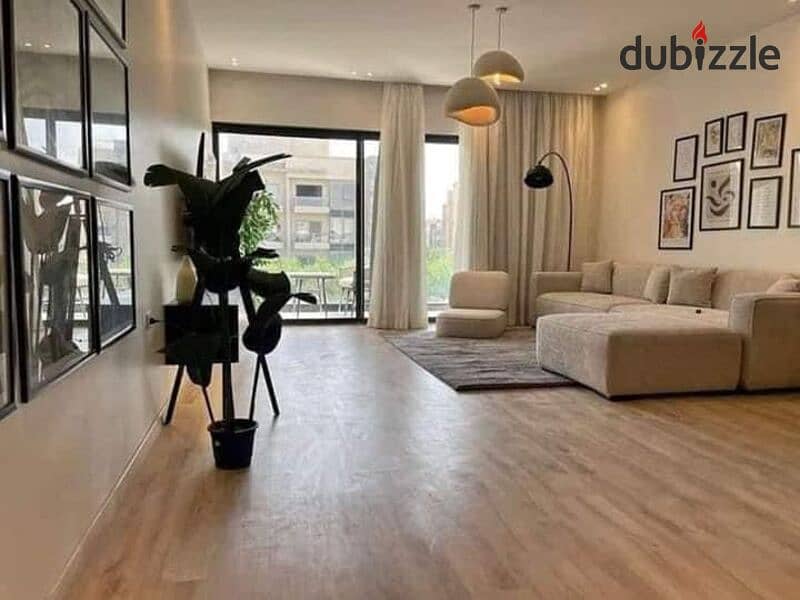 Apartment fully finished in Palm Hills New Cairo directly on ring road