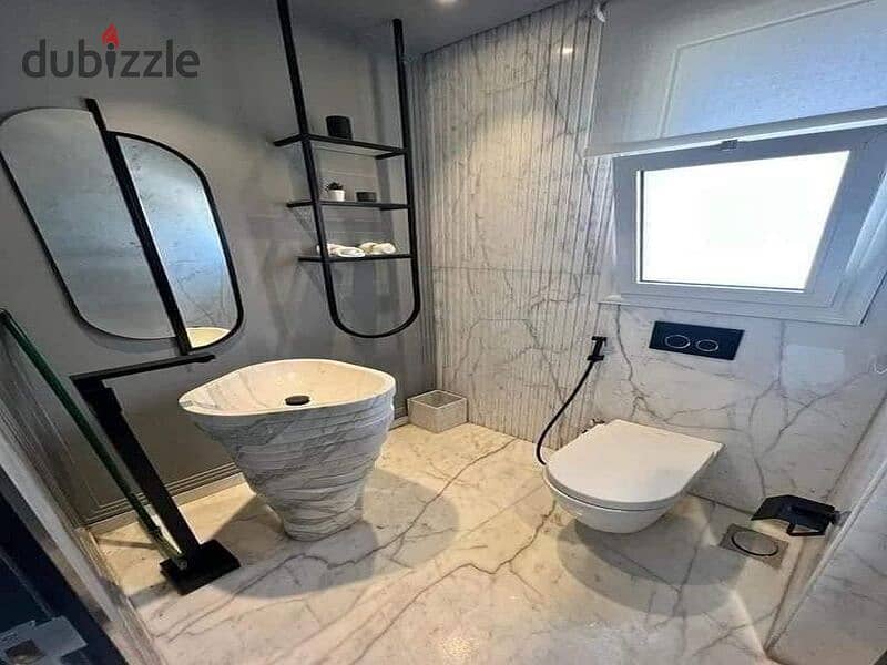 Apartment fully finished in Palm Hills New Cairo directly on ring road