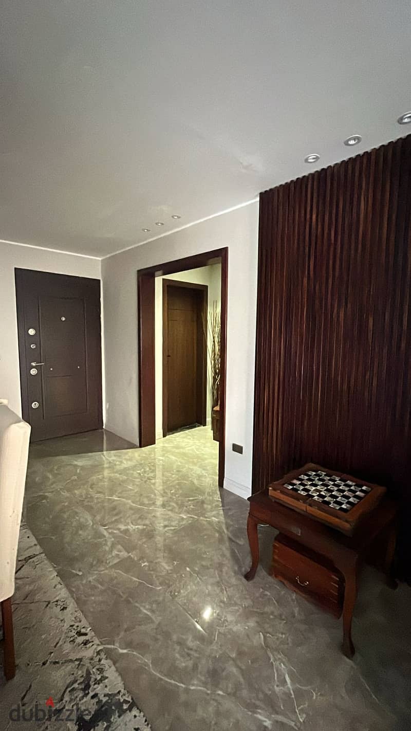 The square New Cairo apartment resale fully finished ground floor