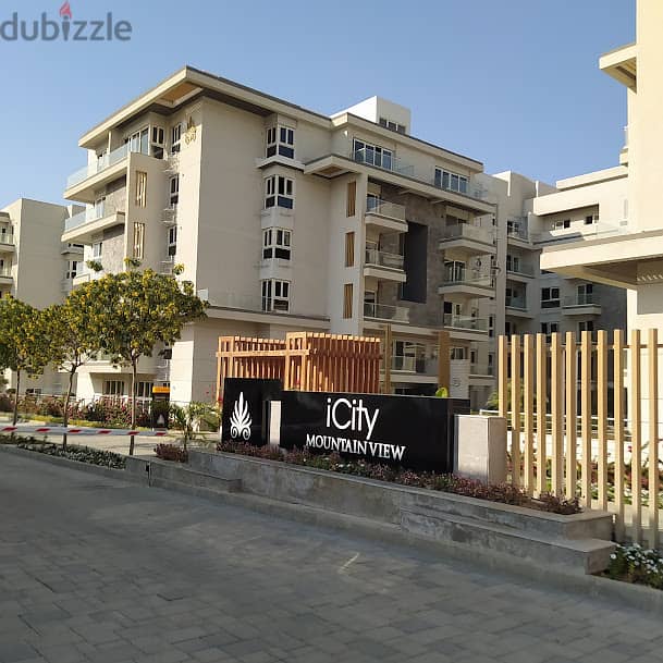 Apartment for sale in "Mountain View iCity" New Cairo An area of 160