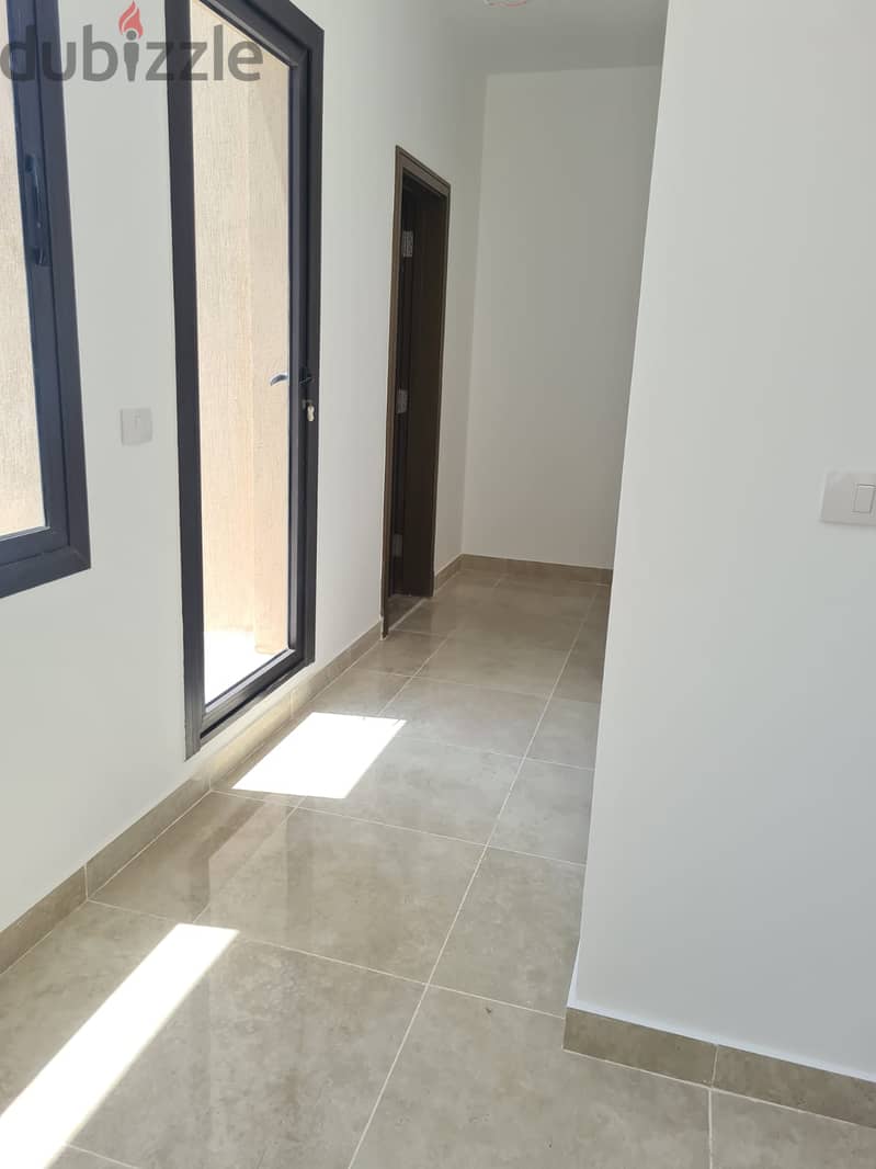 penthouse with AC for rent in Fifth Square Compound Al Marasem New