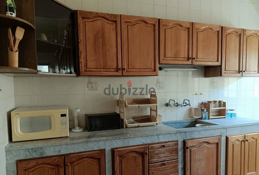 FURNISHED apartment for rent in AMCHIT/JBEIL, with a mountain view