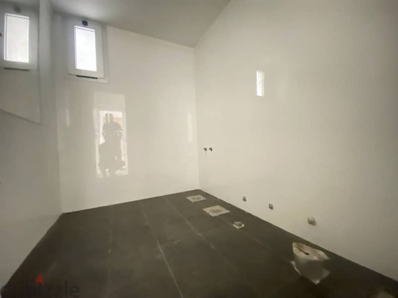 A 130 sqm apartment for sale in Jal el Dib, open greenery views