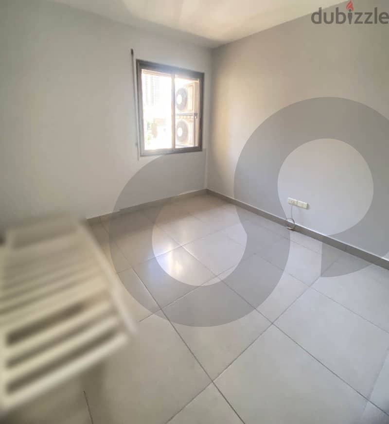 spacious apartment is now listed for SALE in Ashrafieh. REFKL93338