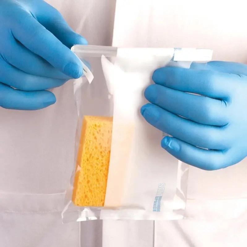 SaniSponge synthetic sponge moistened with peptone water and dabbed