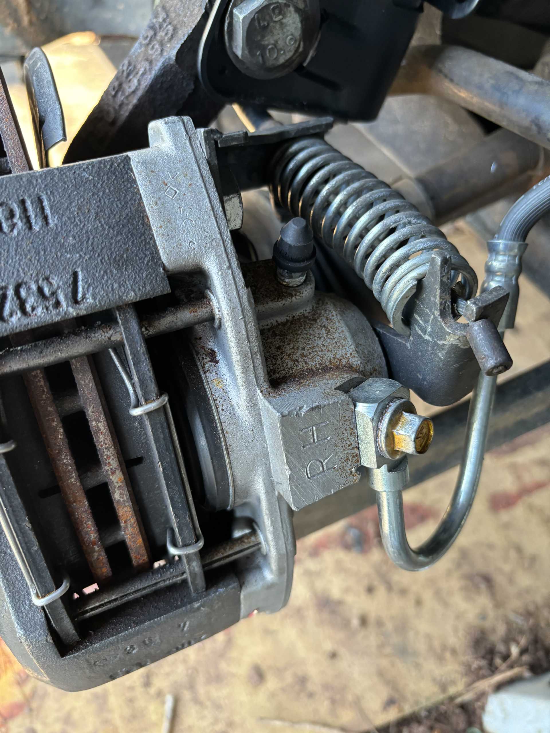 Weird issue on my 88 GT 5speed. Driver side rear brake dust shield