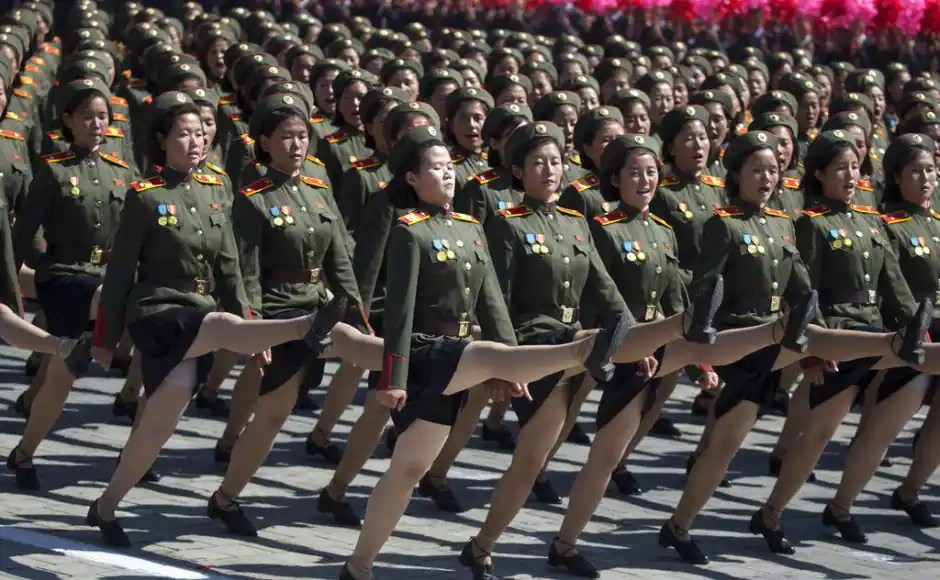 North Korea stages huge parade on country's 70th anniversary, holds back on advanced missile