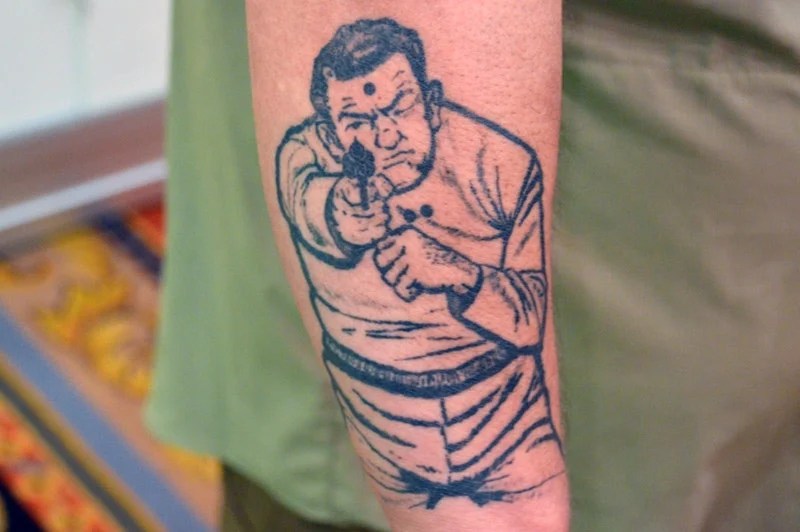 Some of the Best Gun Tattoos We've Seen