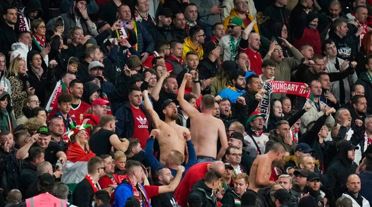 England held 11 by Hungary in match marred by crowd violence