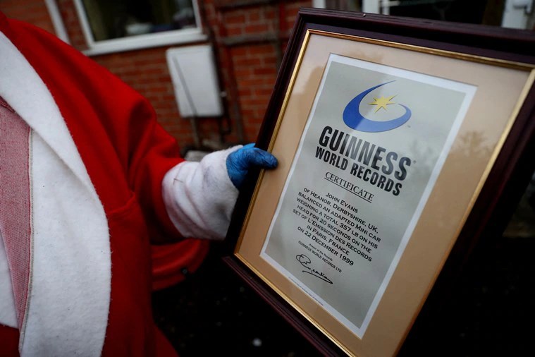 Headbalancing British strongman on record mission for 75th birthday