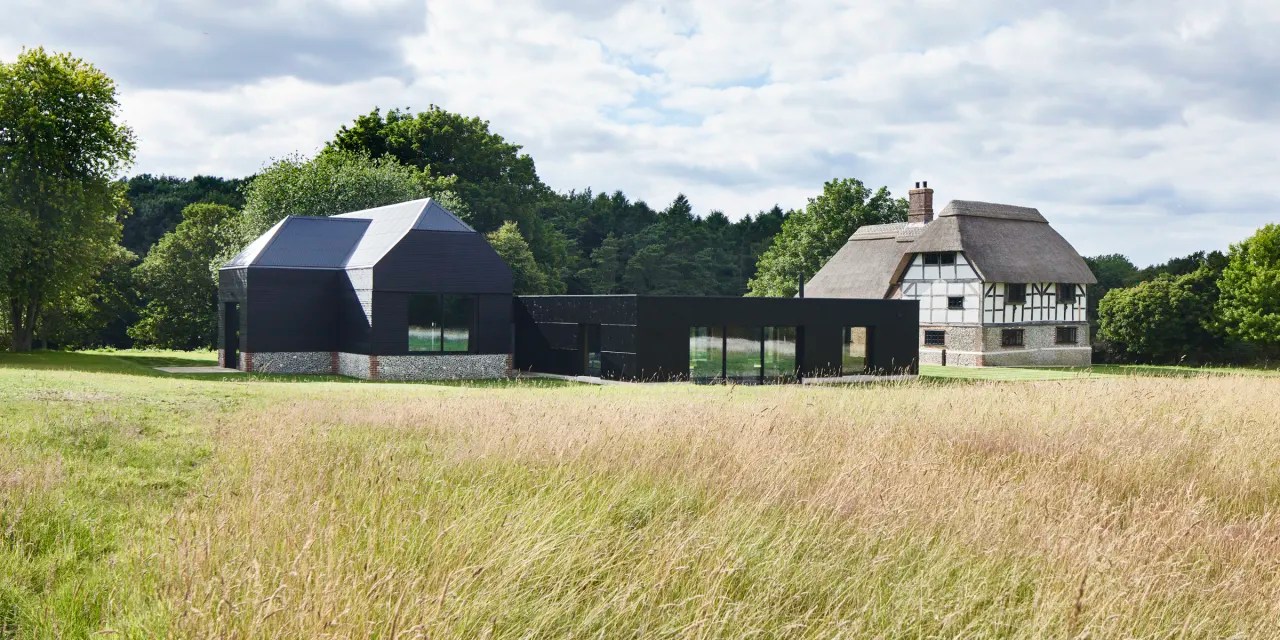 A Dramatic Rebuild Turned This 400YearOld Thatched English Farmhouse