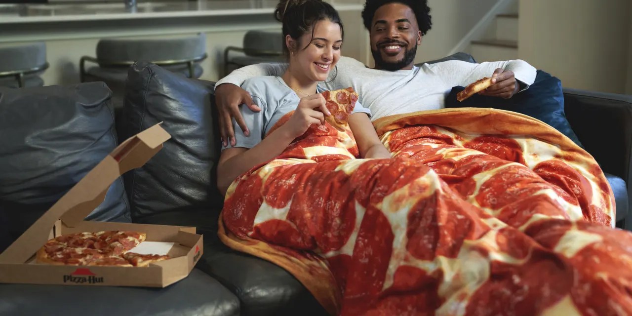 Pizza Hut selling a 150 weighted blanket that looks like a slice of