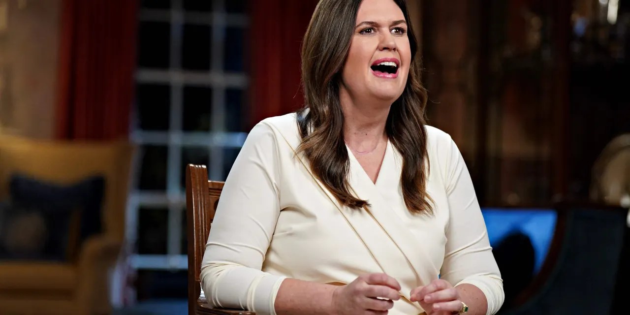 Sarah Huckabee Sanders says the dividing line in America is between