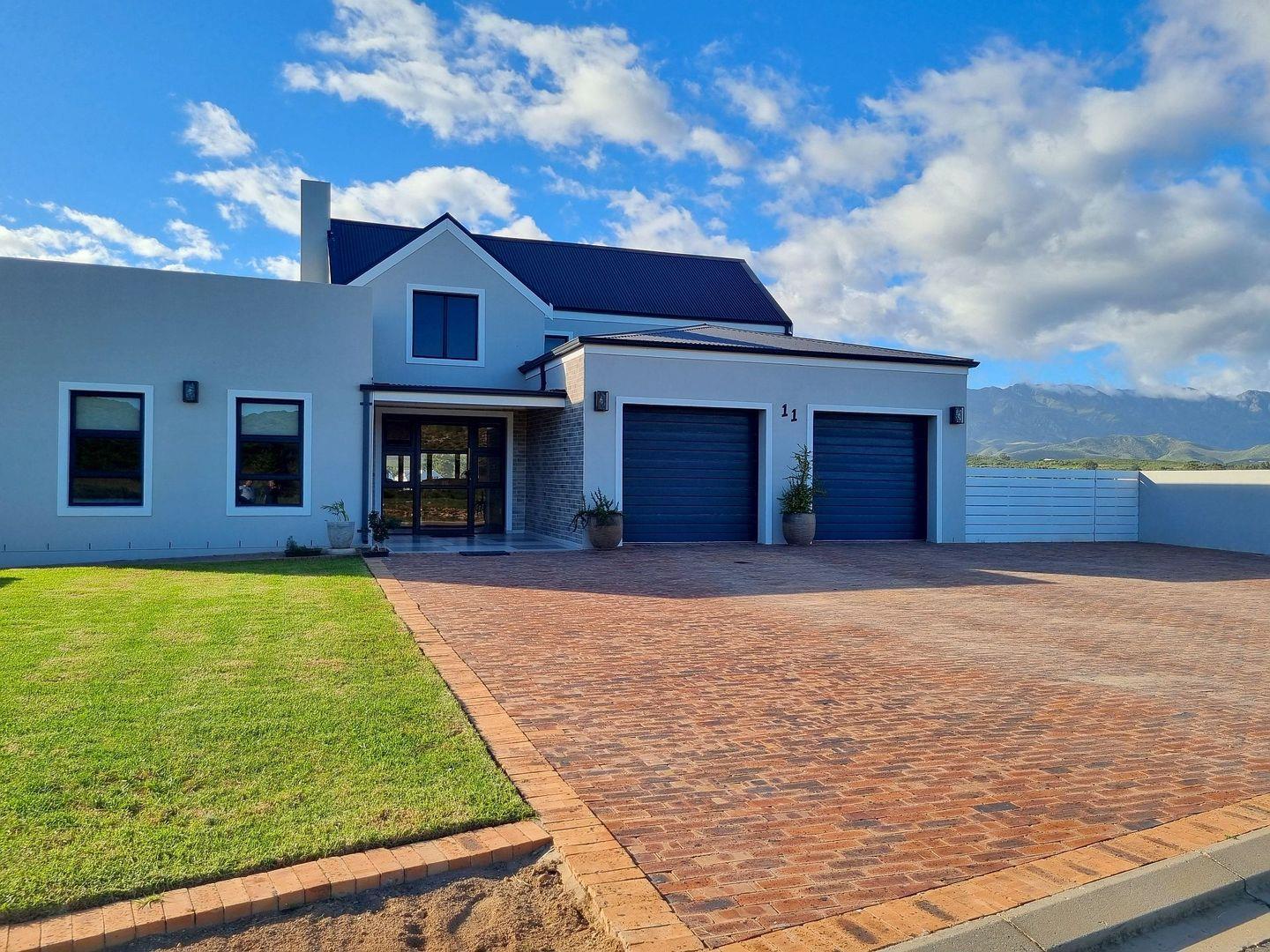 4 Bedroom House for sale in Silwerstrand Golf And River Estate 11