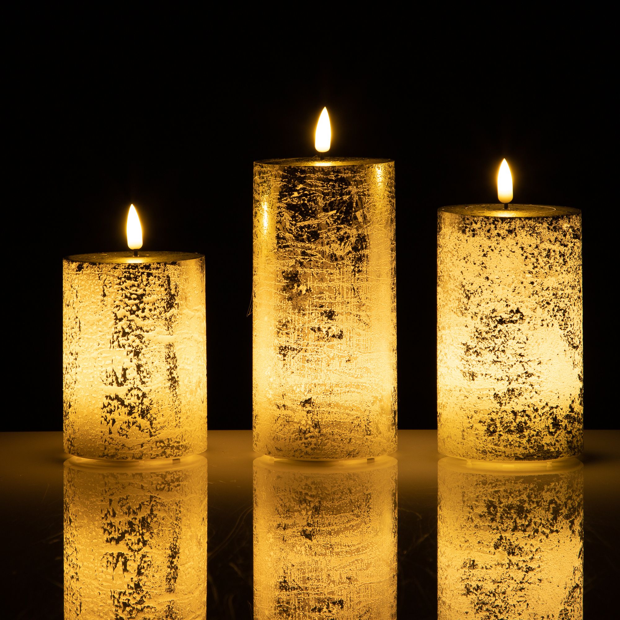 ELAMBIA 3 LEDKerzen Metallicfinish Flamme Luma Höhe 10, 12 & 15cm — QVC.de