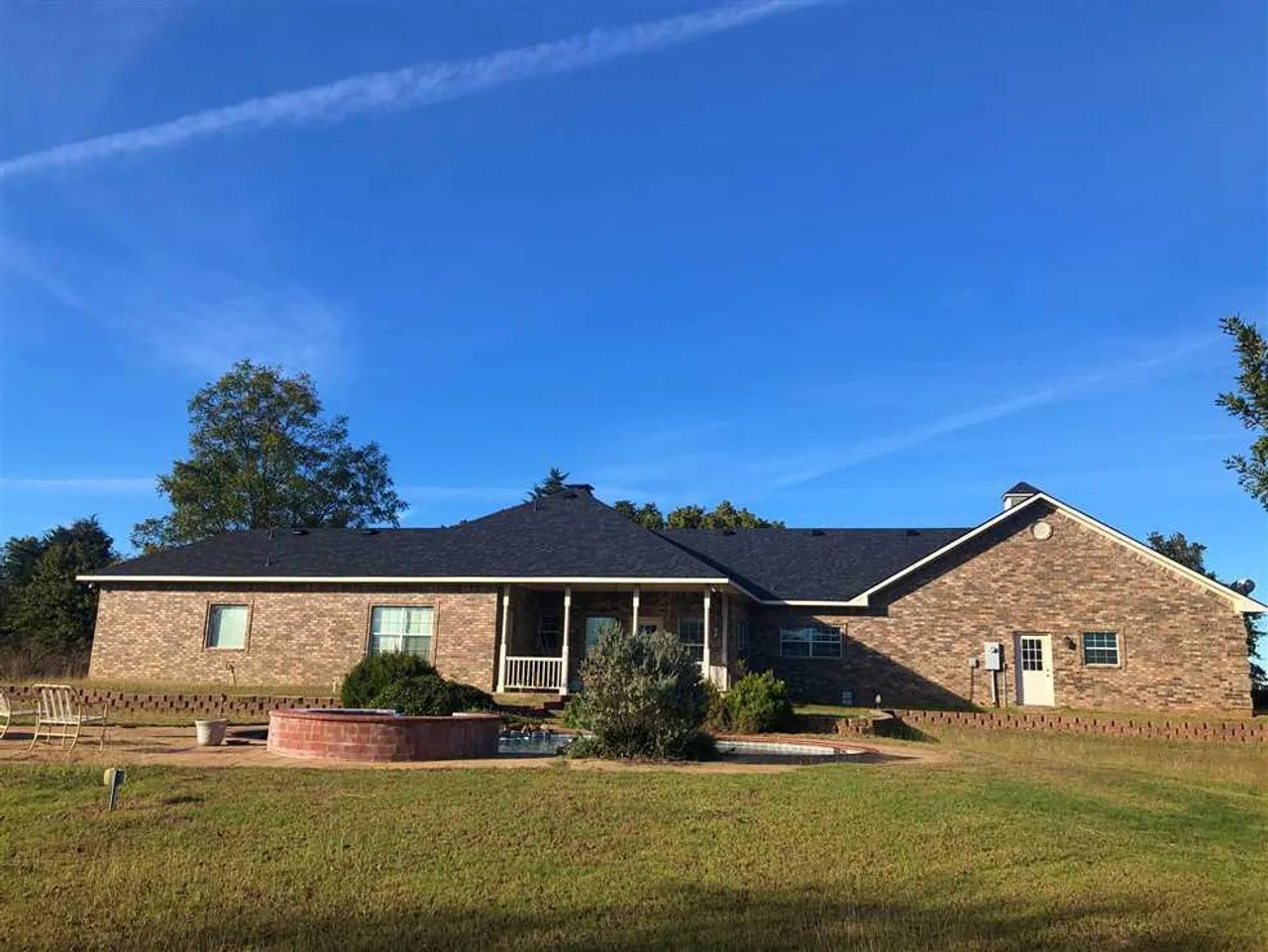 Custom home with pool, shop and PEACH ORCHARD for sale in Cooke County