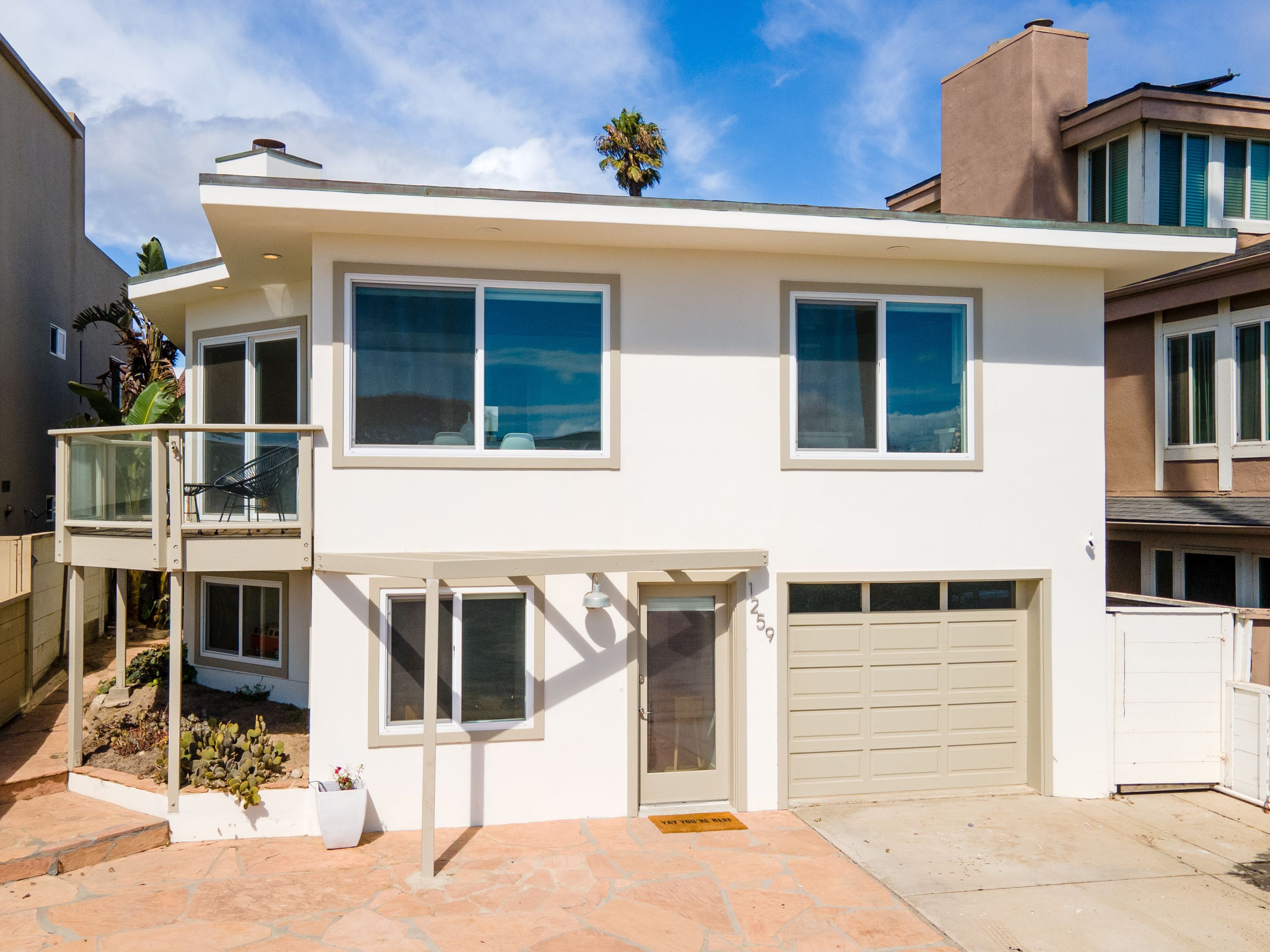 1259NB Modern Hip Beach House RE/MAX Gold Coast Property Management