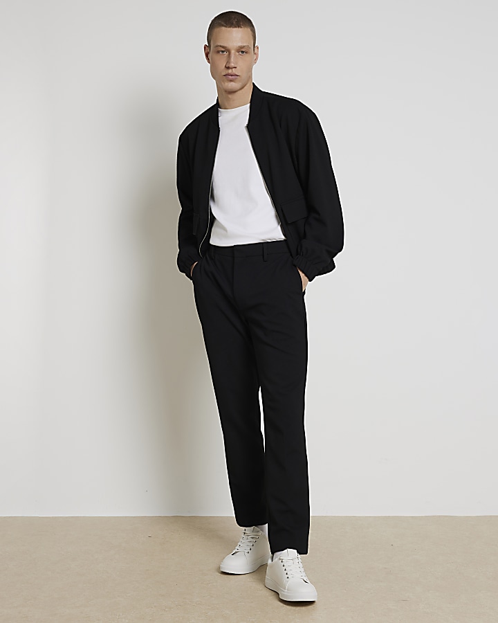 Black slim fit waffle textured trousers River Island