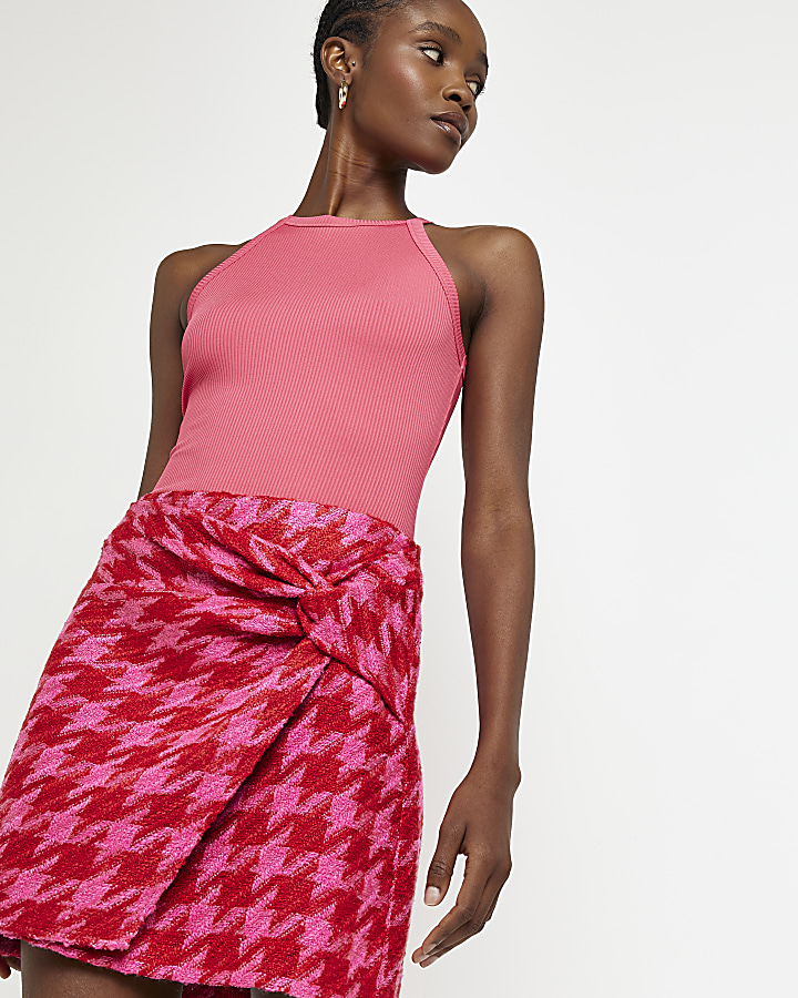 Pink dogtooth wrap mini skirt River Island