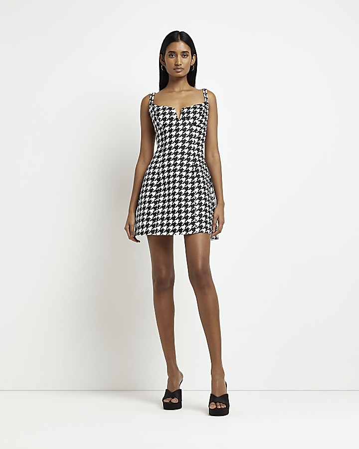 Black dogtooth slip mini dress River Island