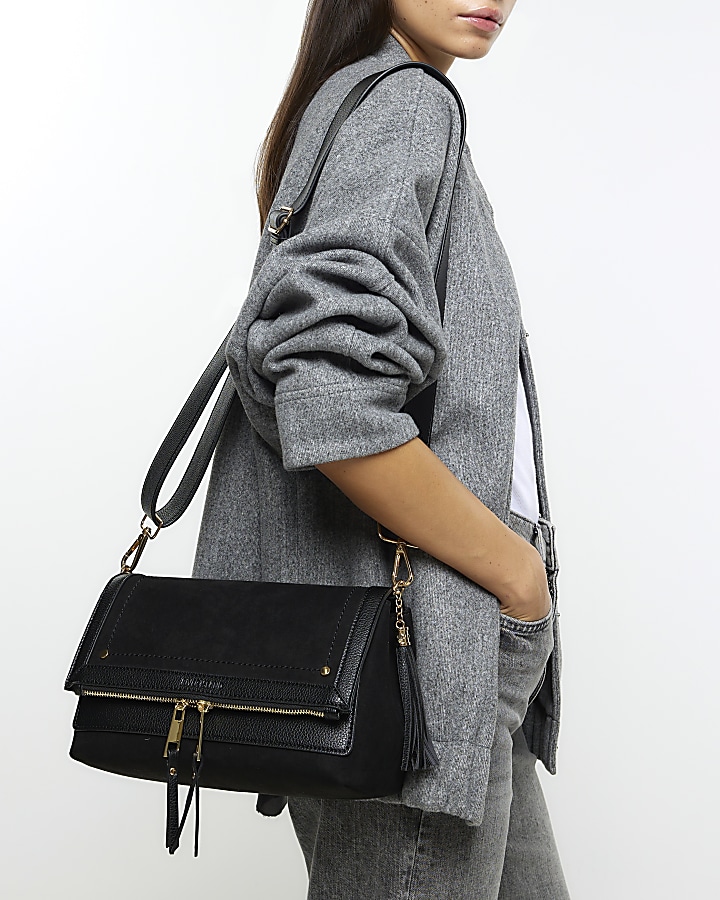 Black zip flapover cross body bag River Island