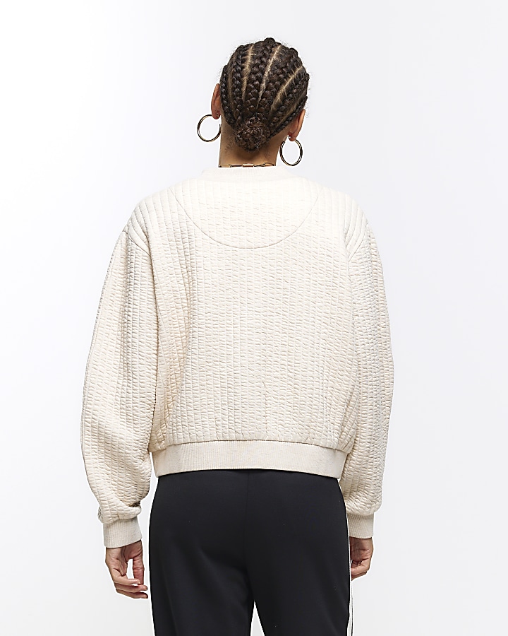 Cream quilted bomber sweatshirt River Island