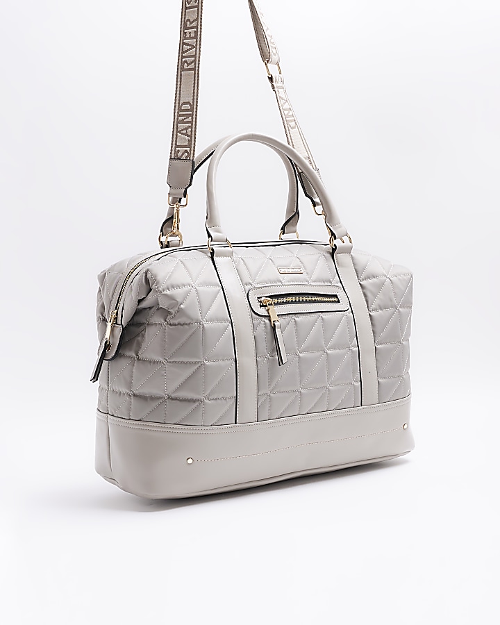 Grey quilted zip travel bag River Island