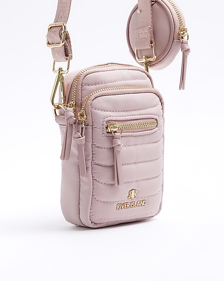 Pink quilted phone cross body bag River Island