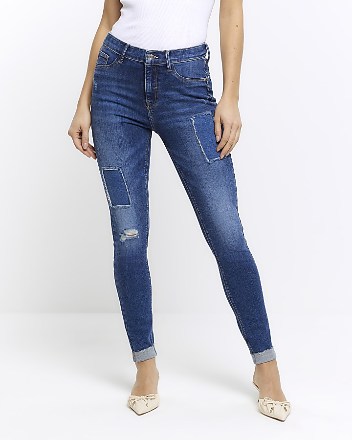 Blue mid rise bum sculpt patch skinny jeans River Island