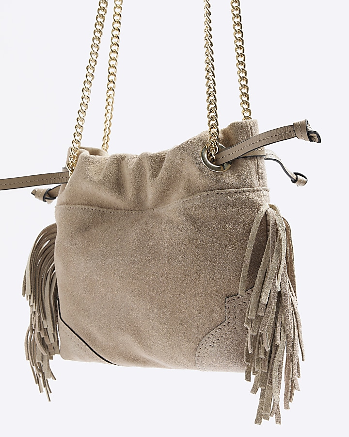 Beige suede fringe duffle bag River Island