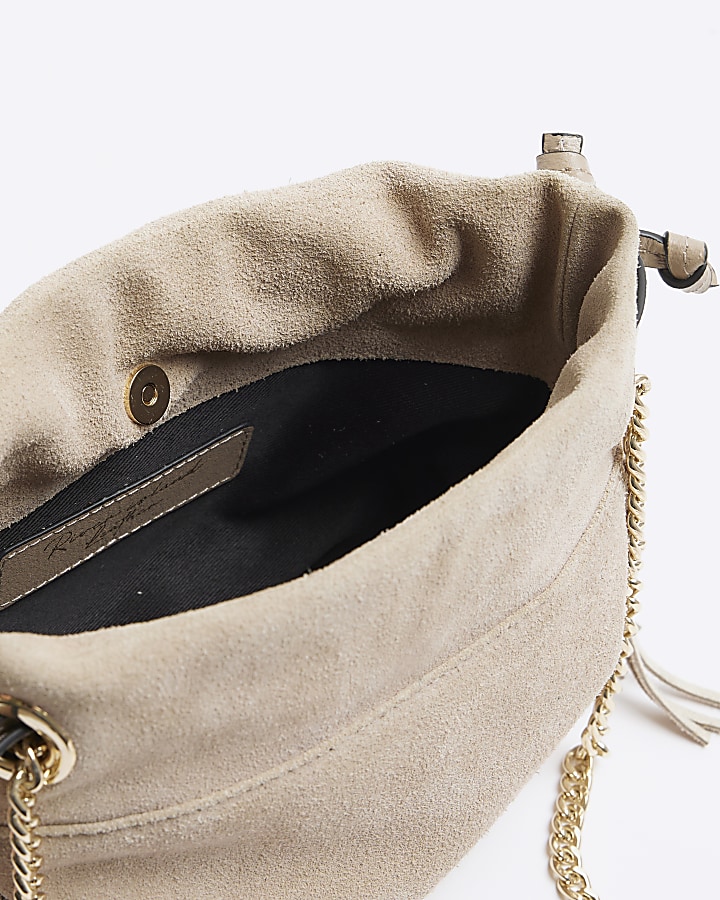 Beige suede fringe duffle bag River Island