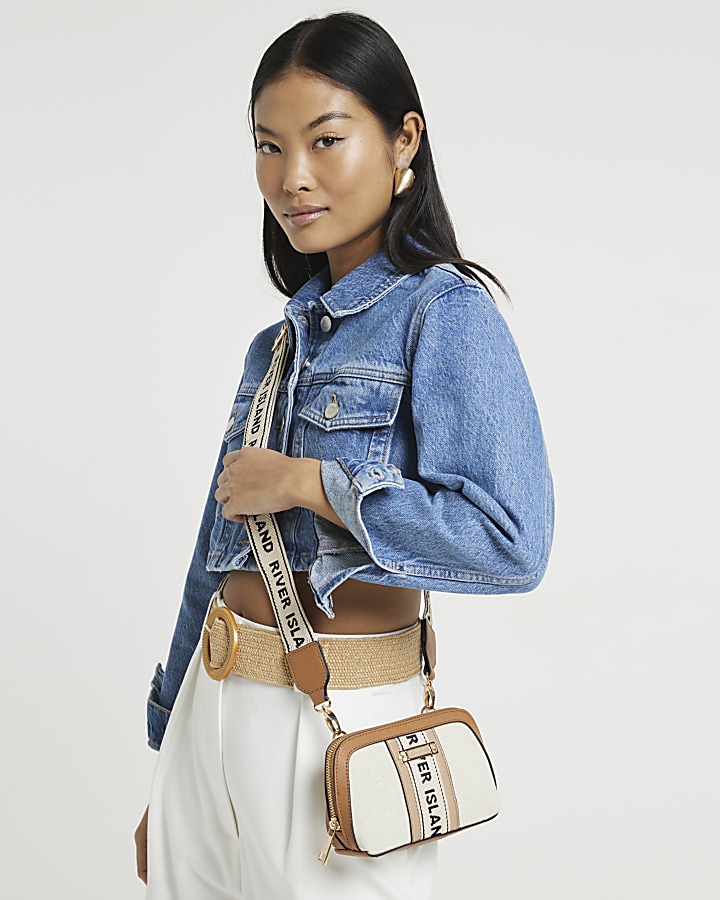 Beige RI monogram cross body bag River Island