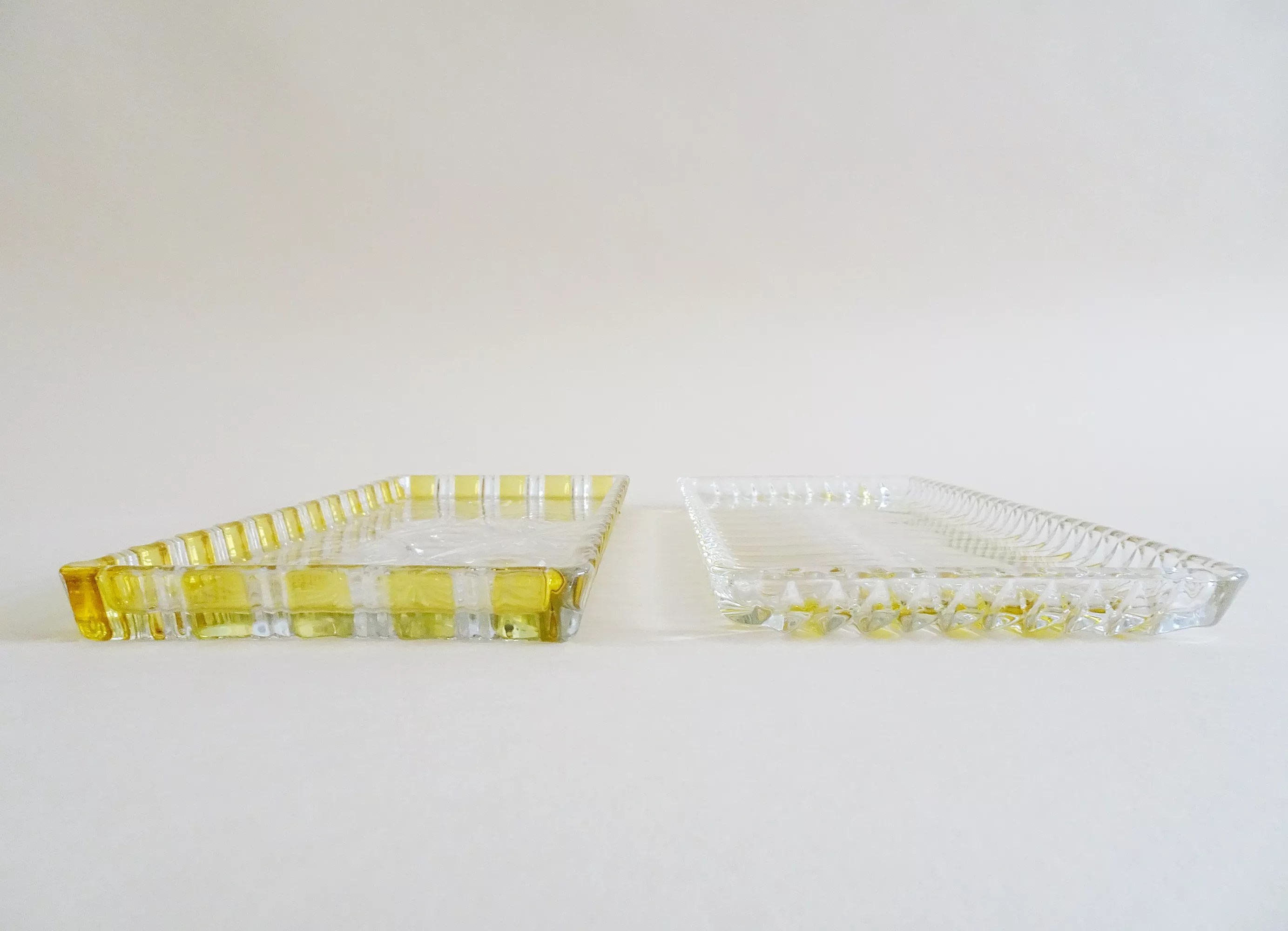 Set of two Walther glass serving plates in yellow, Walther crystal