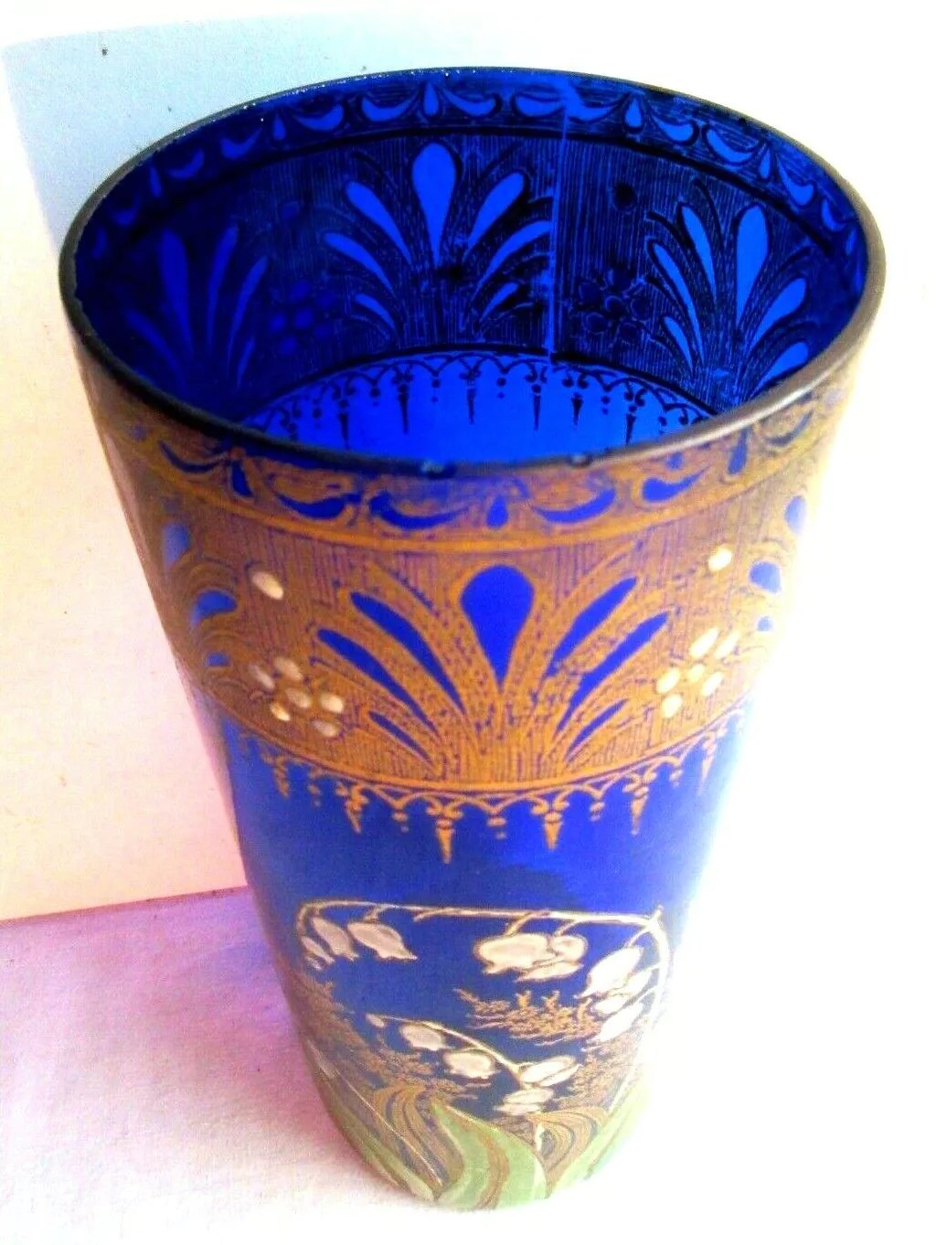 Vase rouleau au muguet, verre bleu émaillé Legras et sérigraphié doré