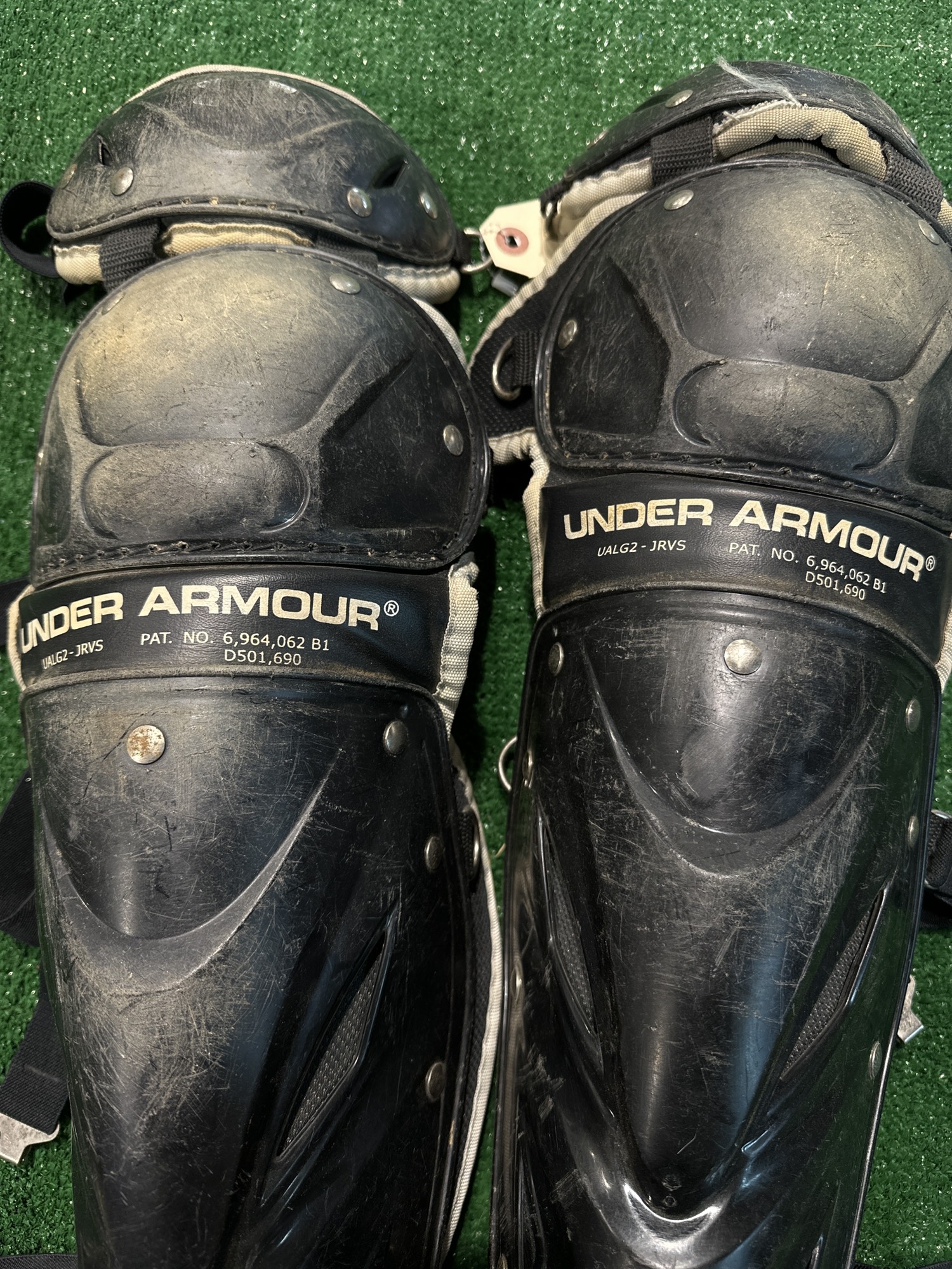 Used Adult Under Armour Catcher's Leg Guards SidelineSwap