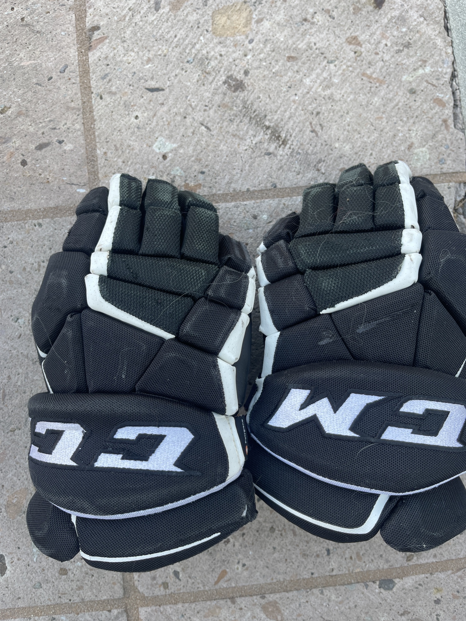 Heavily Used Ccm super tacks as1 gloves SidelineSwap
