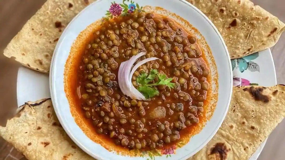 Akkha Masoor Dal Health And Taste Served With Hot Tadka