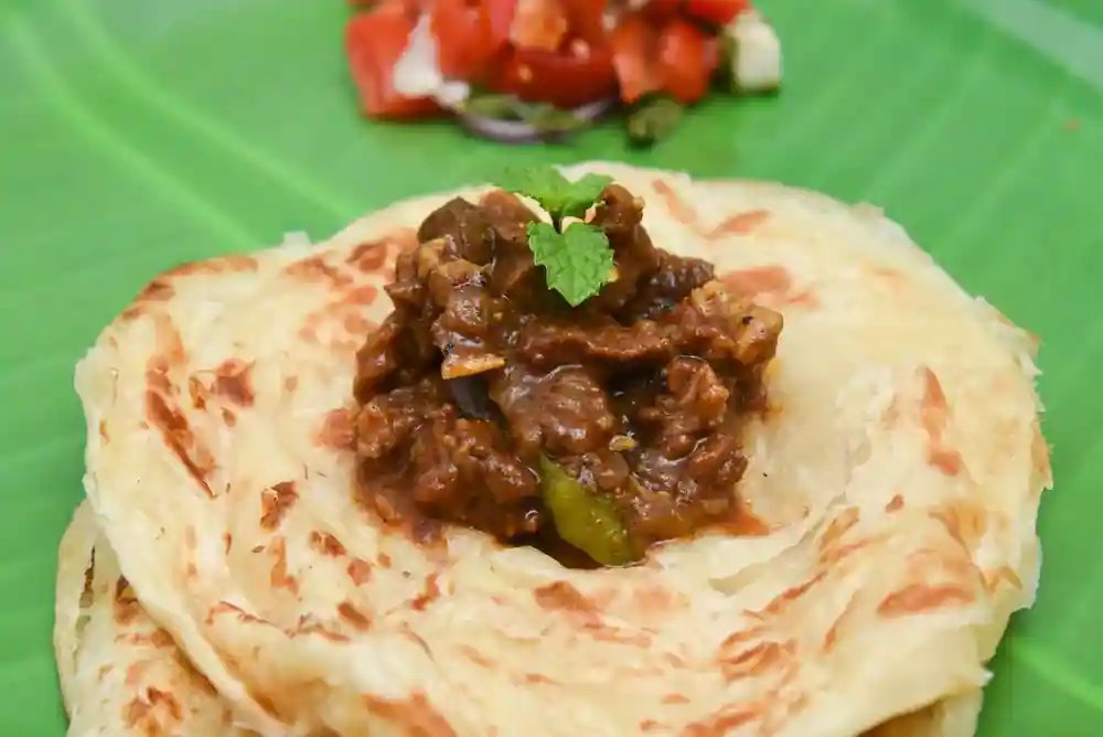 MultiLayered Parotta and Beef Fry, Kerala's Best On Your Plate