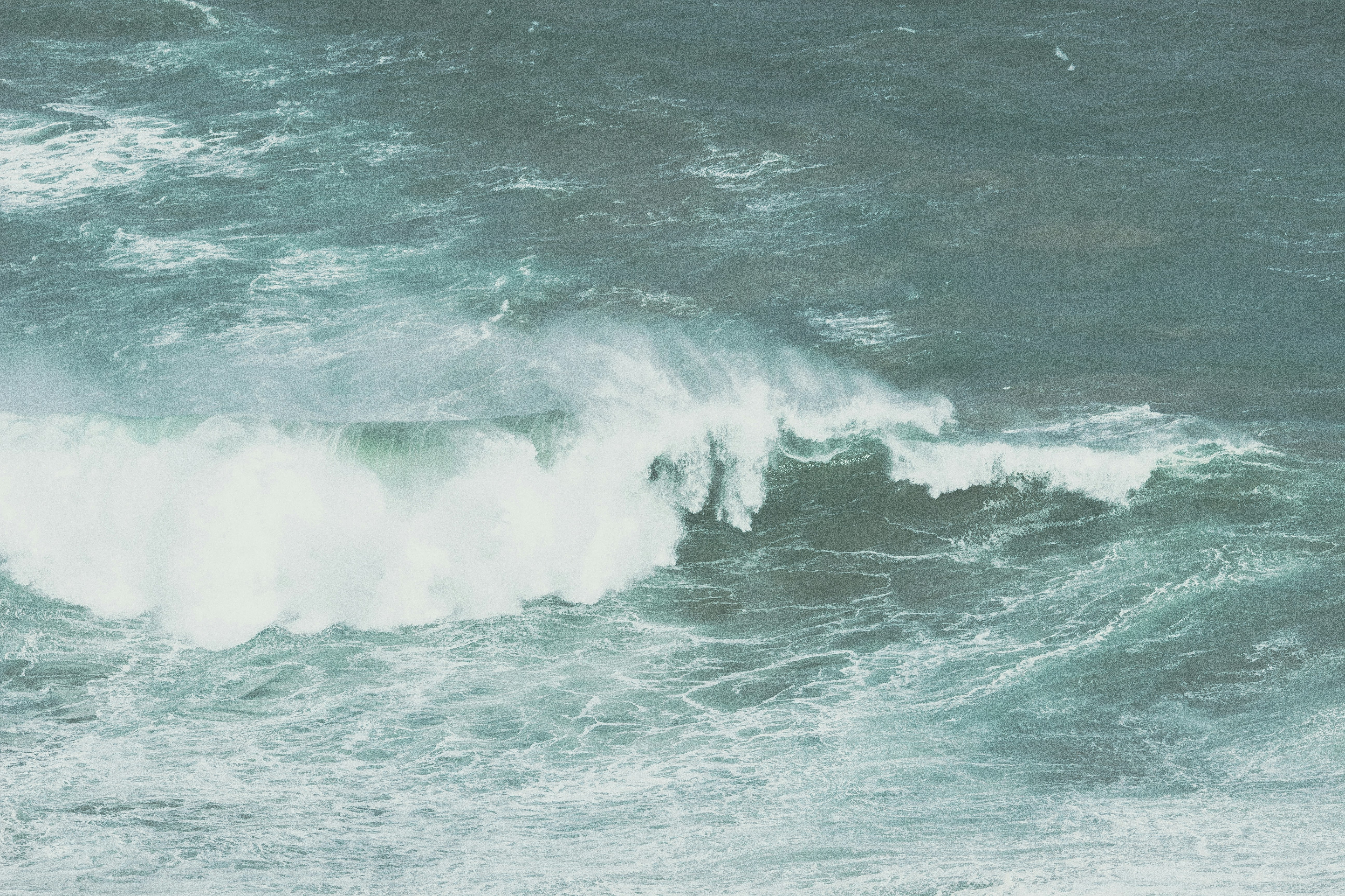 gray ocean wave during daytime photo Free Grey Image on Unsplash