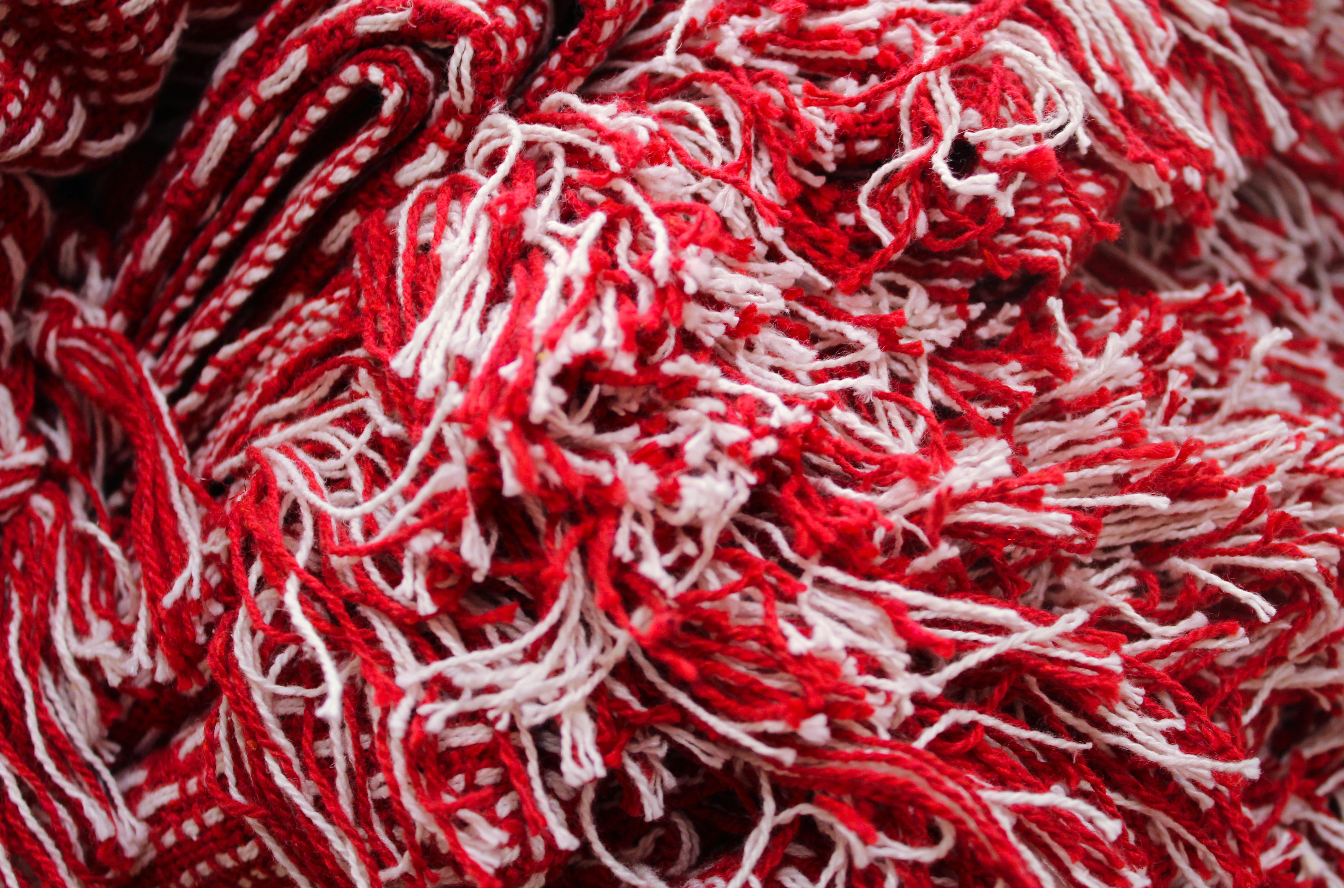 Red and white fabrics photo Free Cheering Image on Unsplash