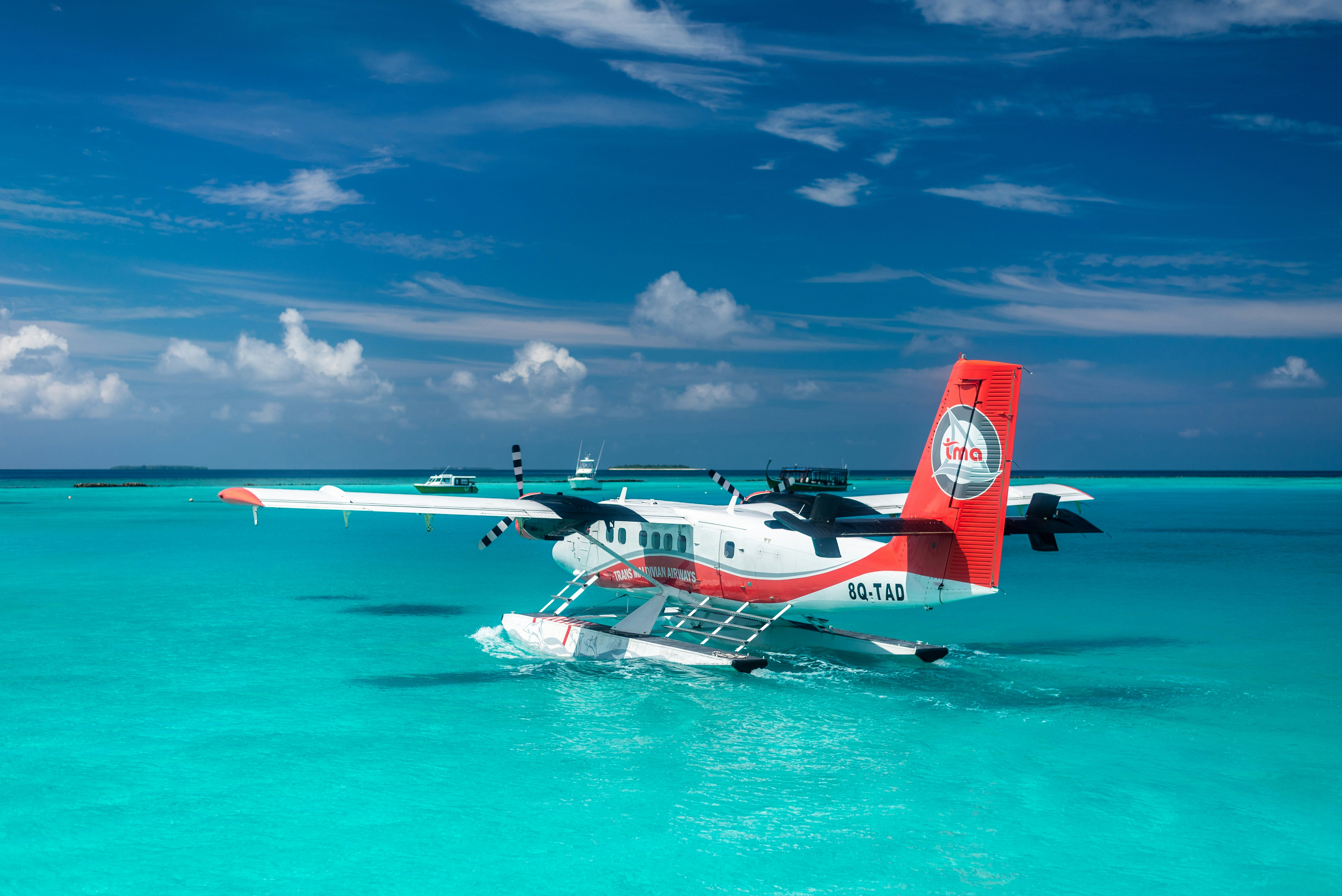 plane land on water photo Free Seaplane Image on Unsplash