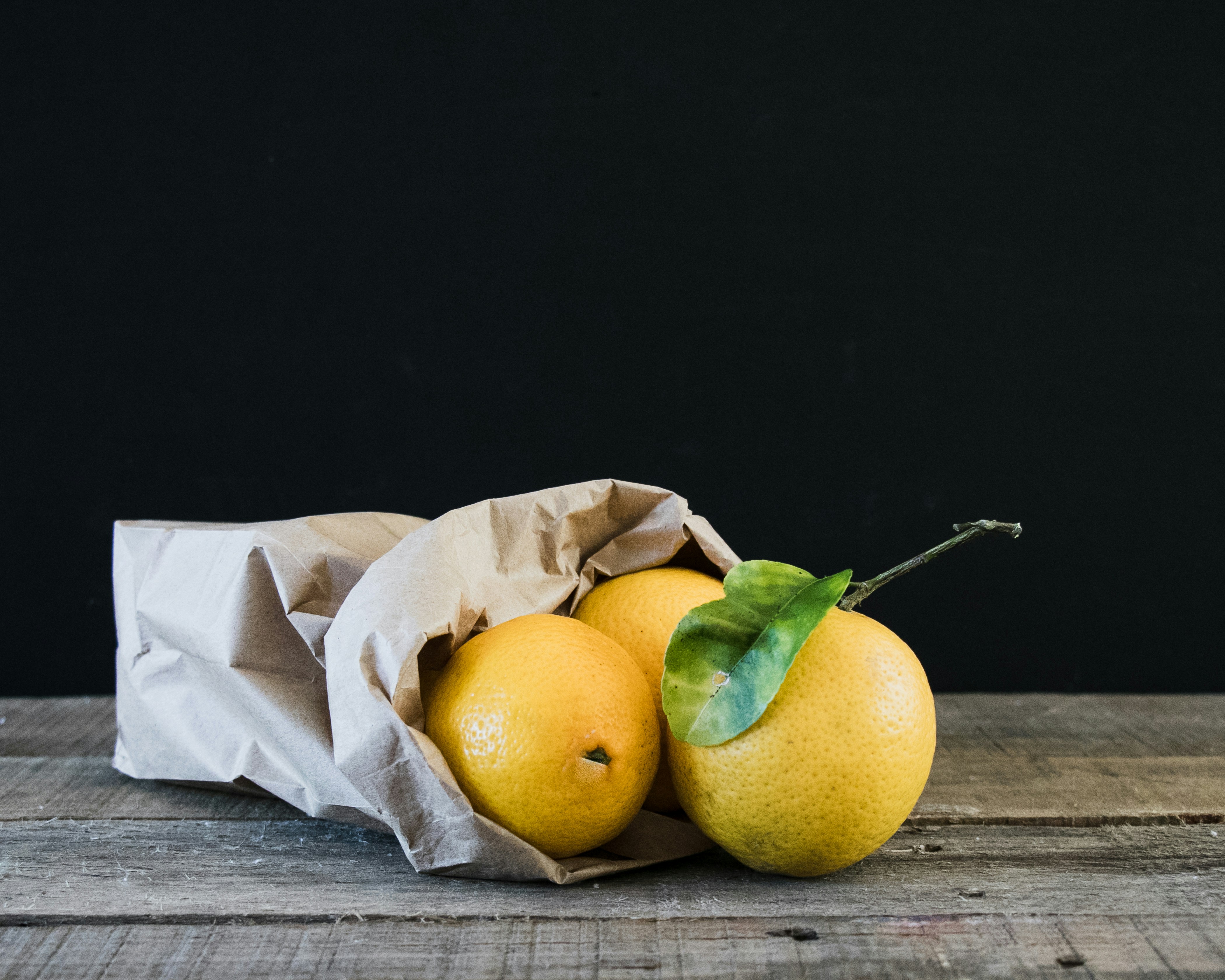 three yellow citrus fruits photo Free Jacksonville Image on Unsplash