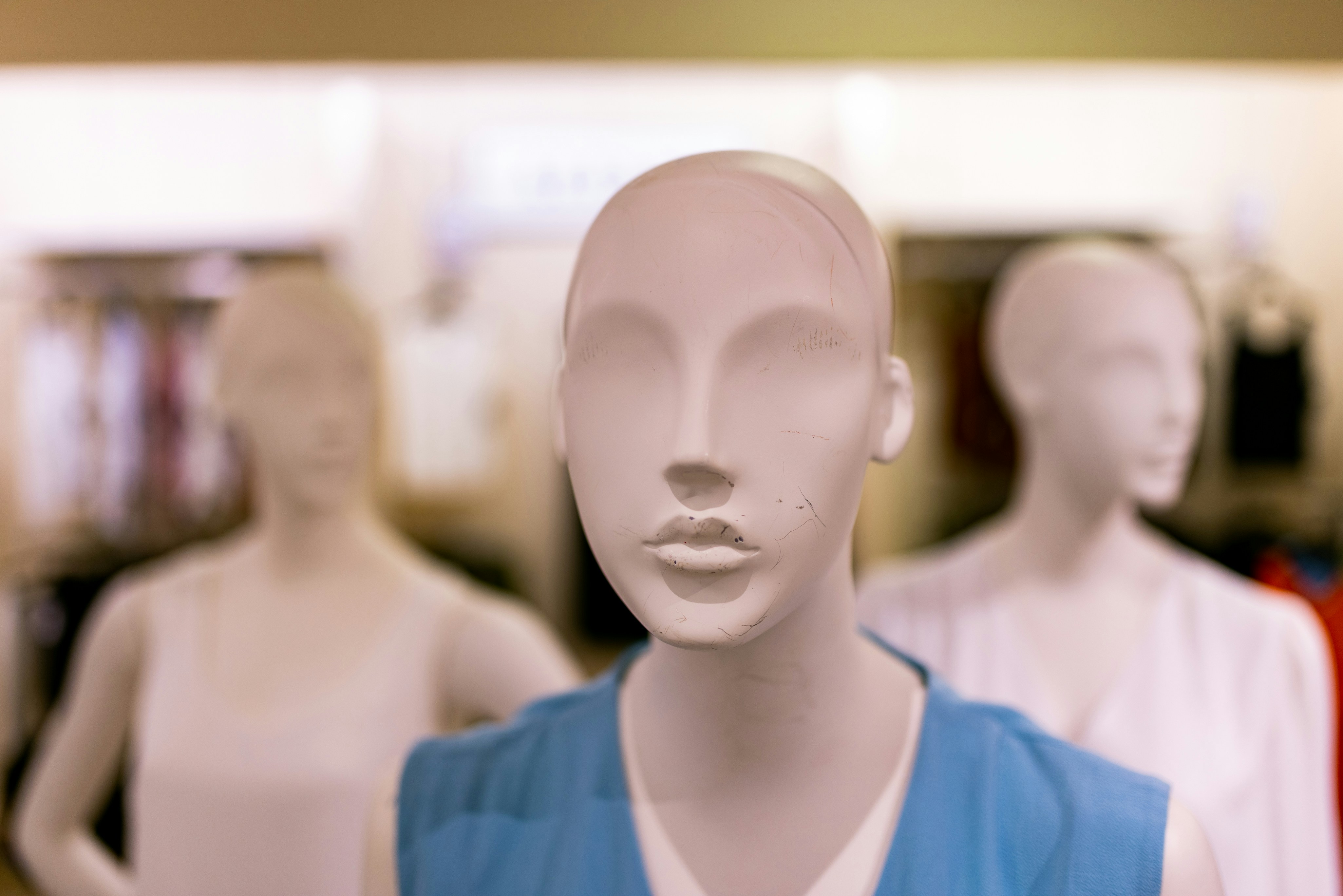 A display of mannequins in a clothing store photo Free Mannequin