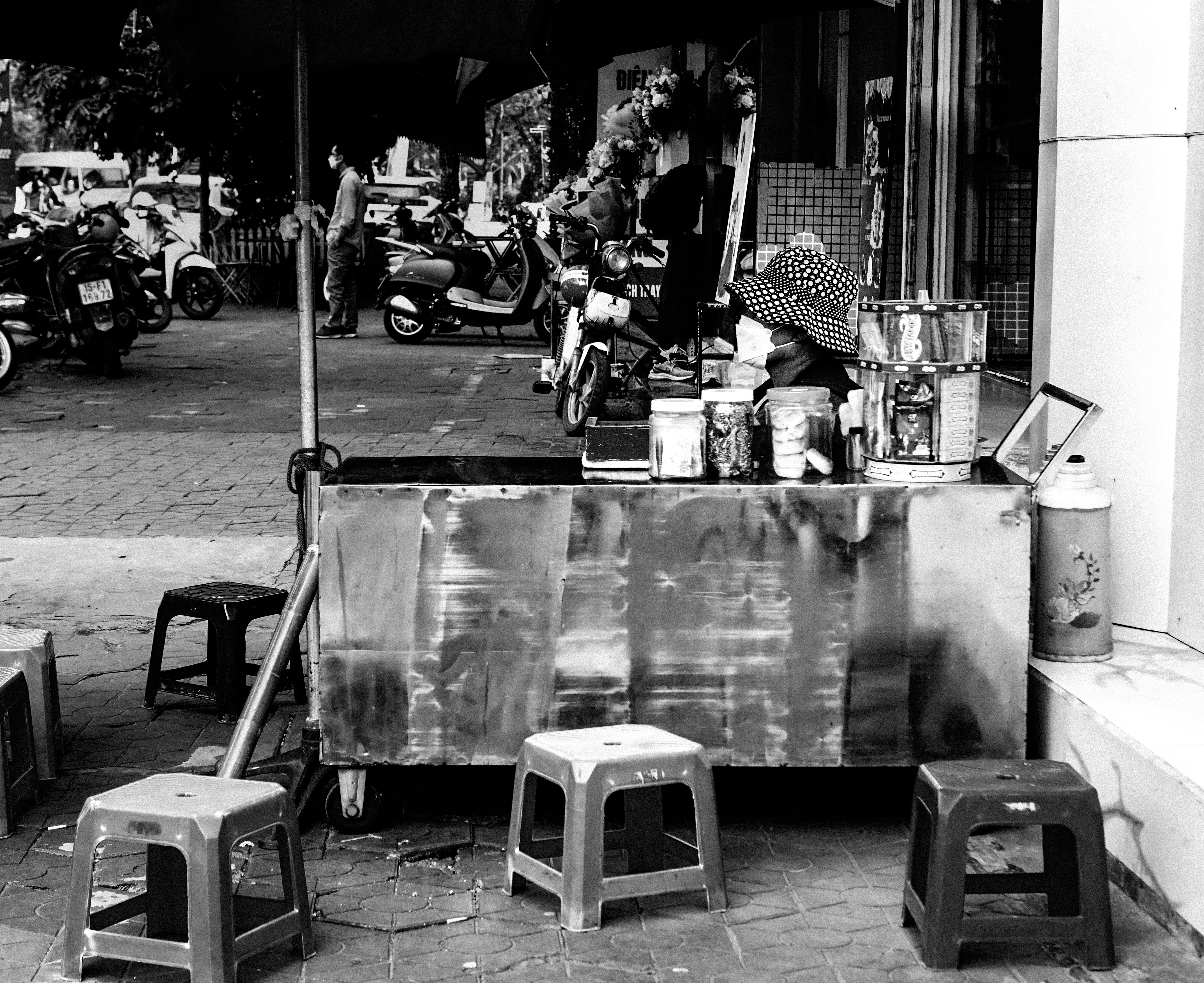 A person selling food on the street photo Free Hai phong Image on